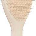 <img src="brosse-large-couleur-vanille.jpg" alt="Brosse Large Couleur Vanille Tangle Teezer - Démêlage rapide pour cheveux longs" />